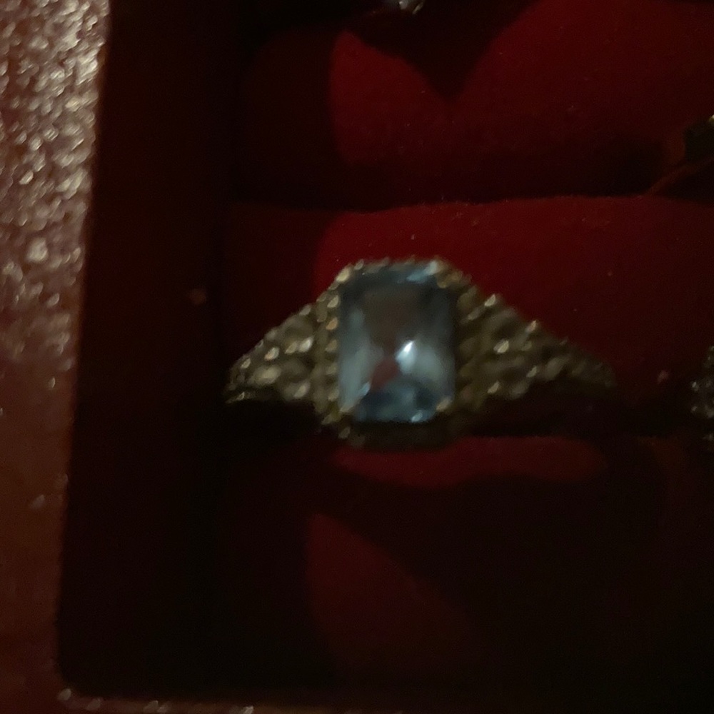 Sky blue topaz ring with accent stones